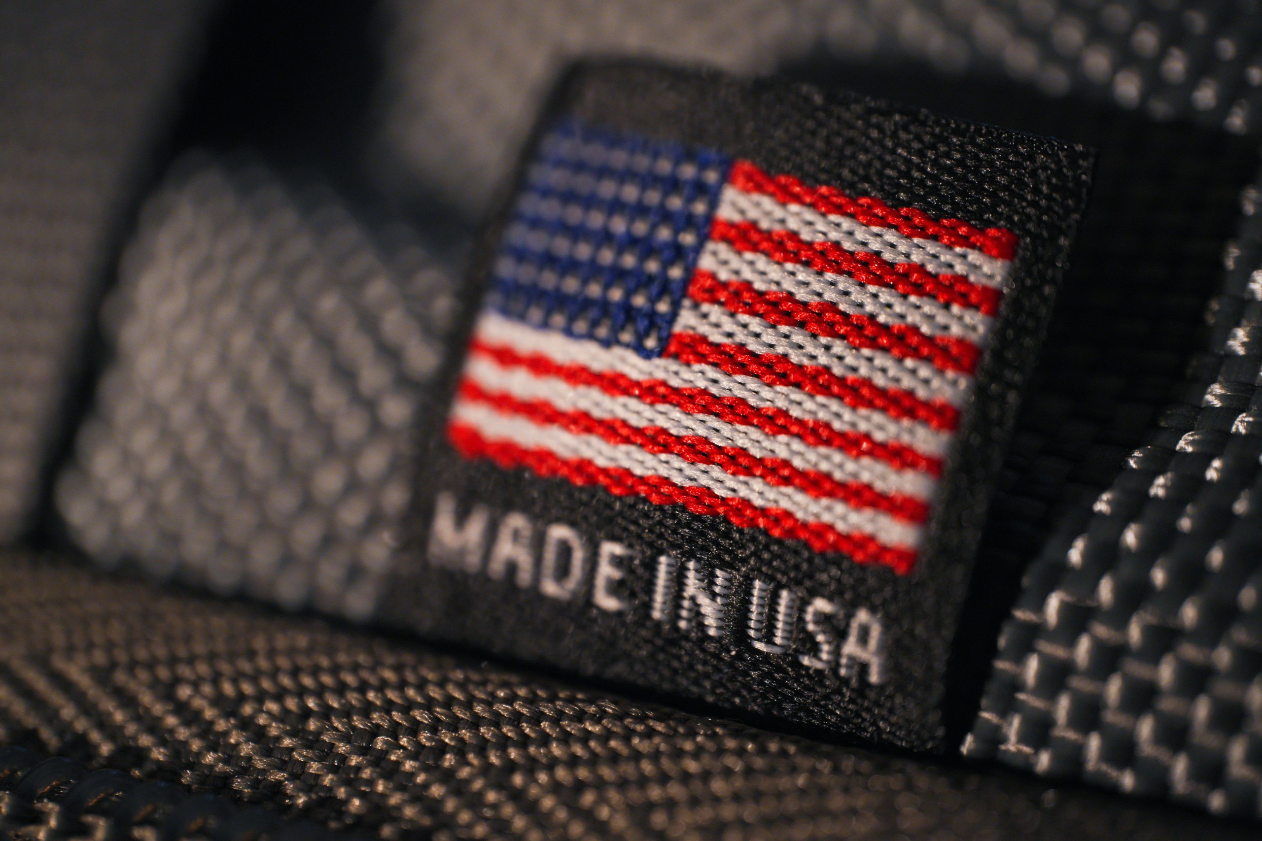 Macro close-up of a Made in USA fabric label tag.